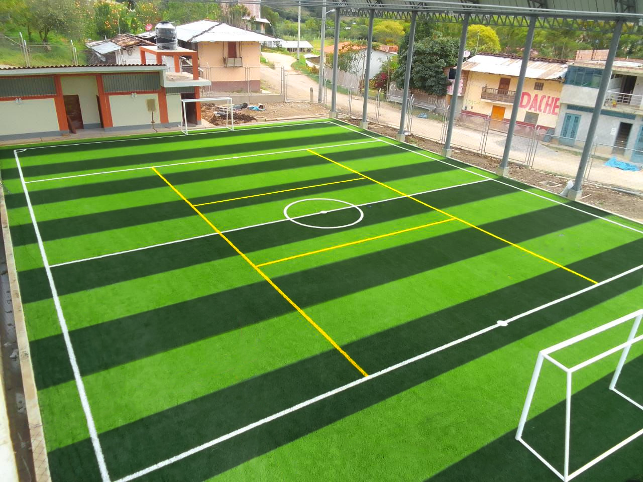Aerial view of a football field with artificial turf at Montana Tech